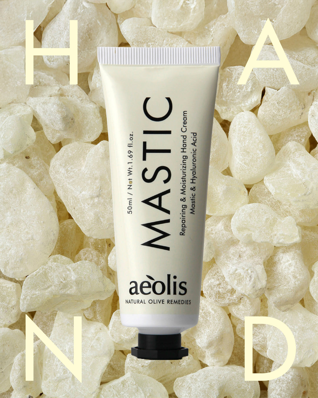 Aeolis Mastic hand cream tube on a textured beige background