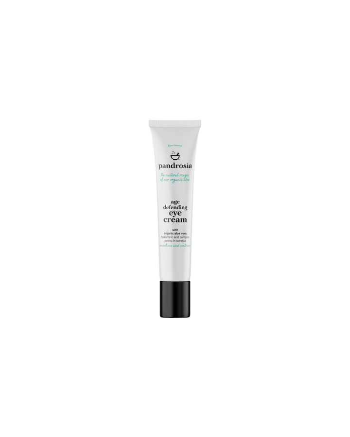 Tube of eye cream on a black background