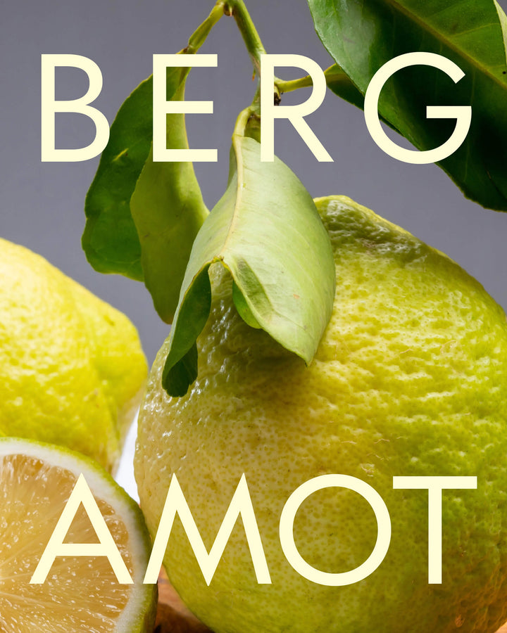Close-up of lemons with leaves and &