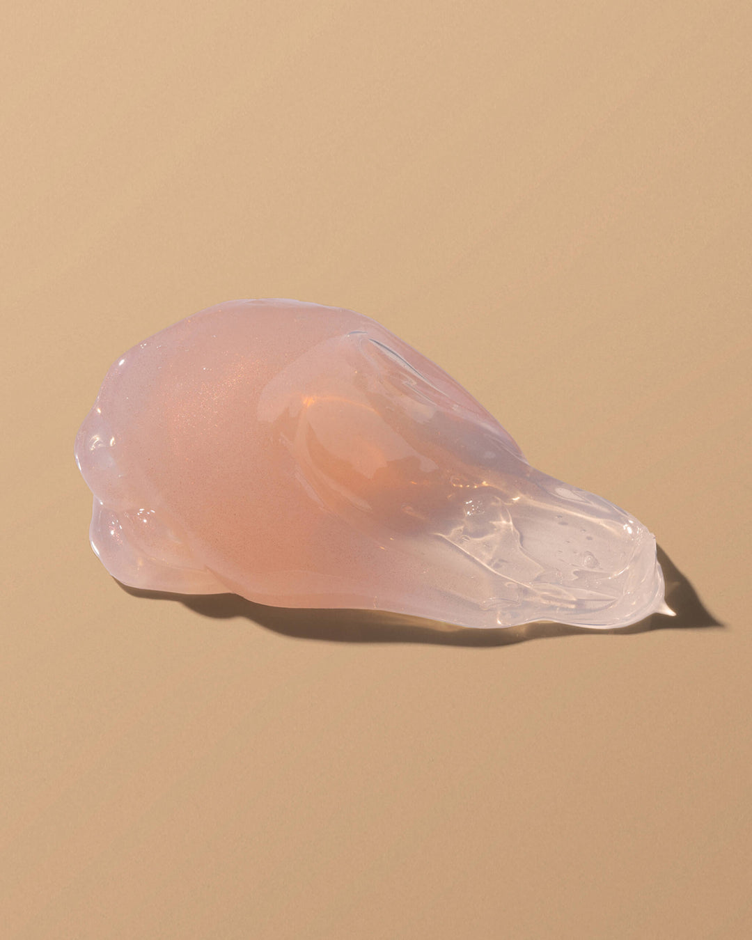 Cleansing Oil Gel Swatch on beige background