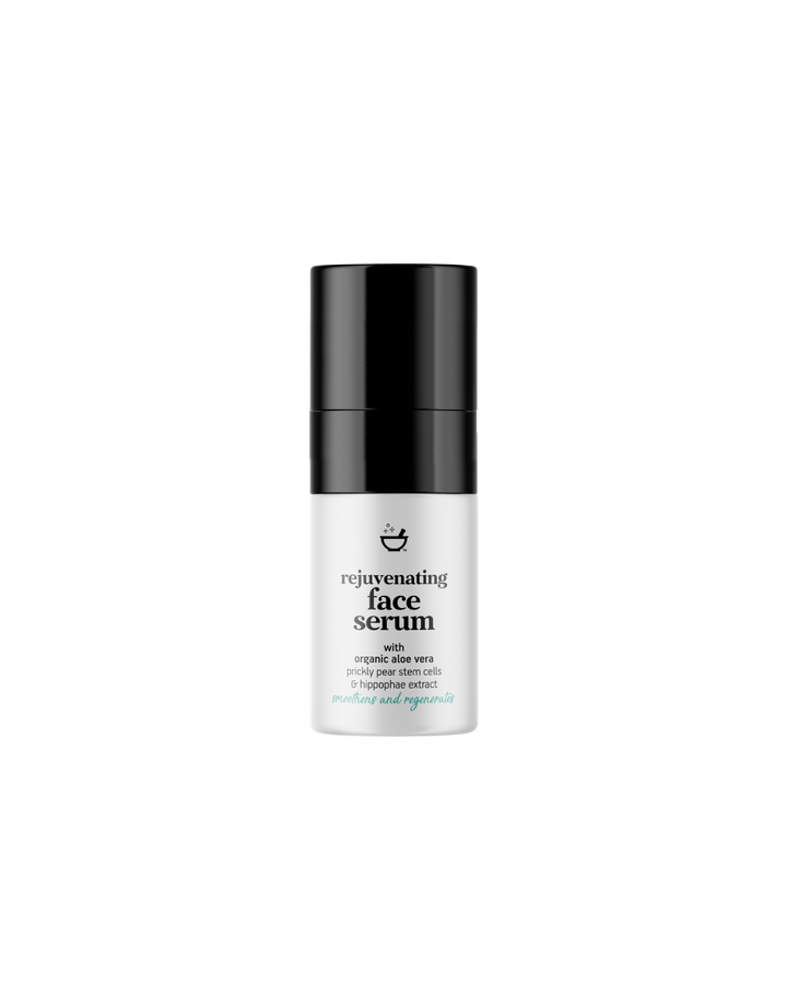 Skincare serum bottle labeled &
