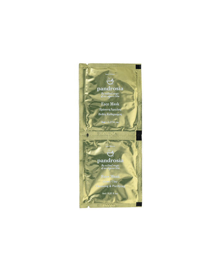 Two gold face mask packets