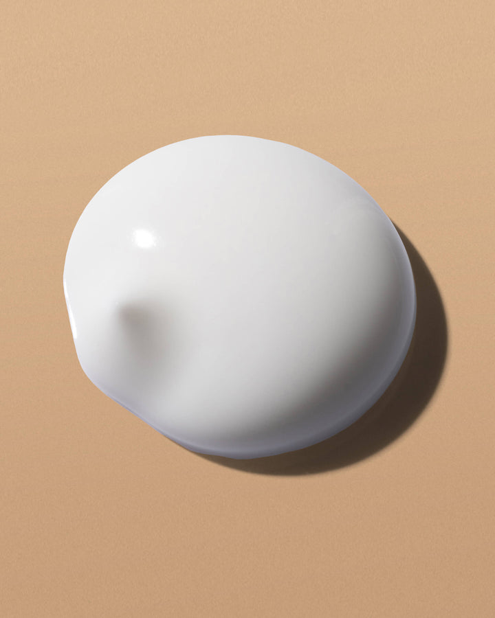 White swatch on a beige background